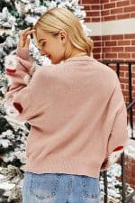 pull noel femme rose pere noel vue de dos