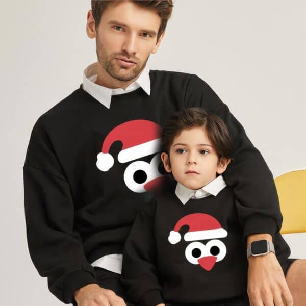 Pull de Noël Pingouin Noir père et fils