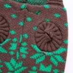 Pull de Noël petit chien marron flocon de neige vue manches