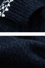 pull bleu zippe floccons noel vue manche