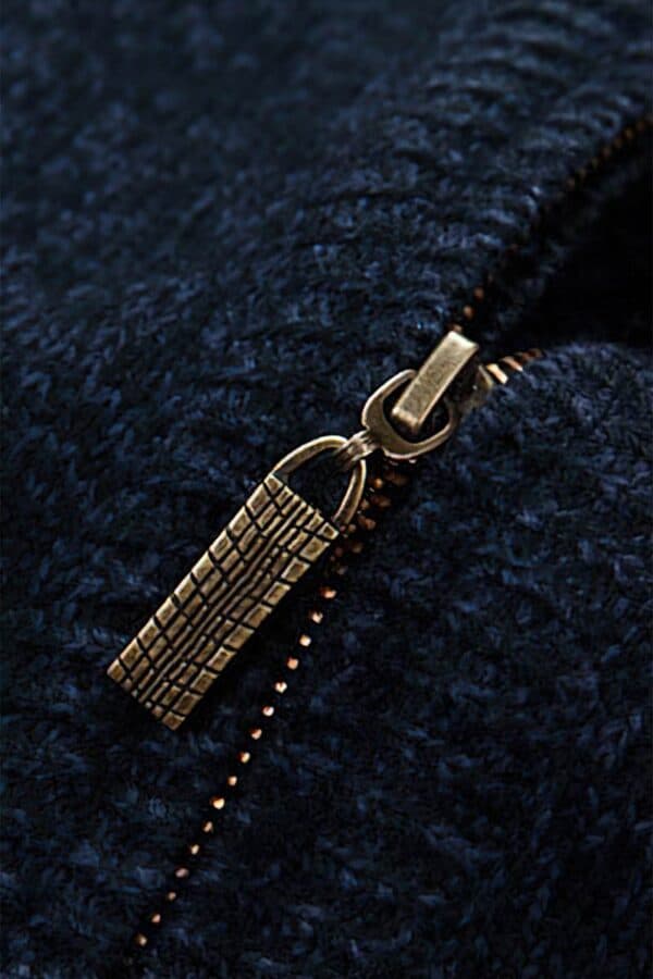 pull bleu zippe floccons noel vue zippe