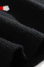 pull noir santa claus vue bas
