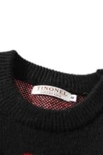 pull noir santa claus vue du col