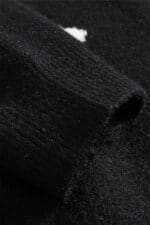 pull noir santa claus vue manche