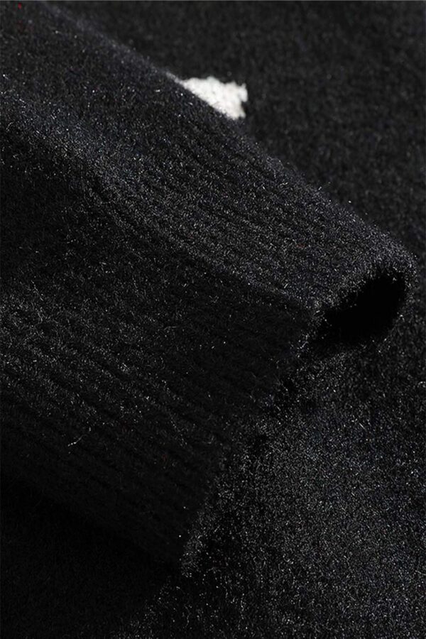 pull noir santa claus vue manche